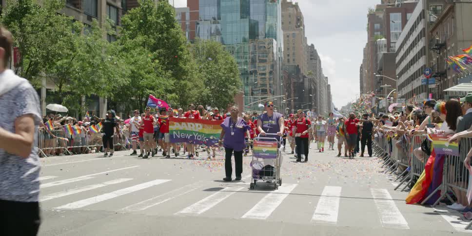 People walk together in the parade