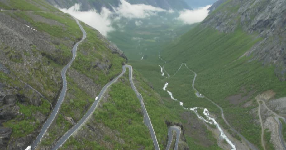 A road winds through the mountains