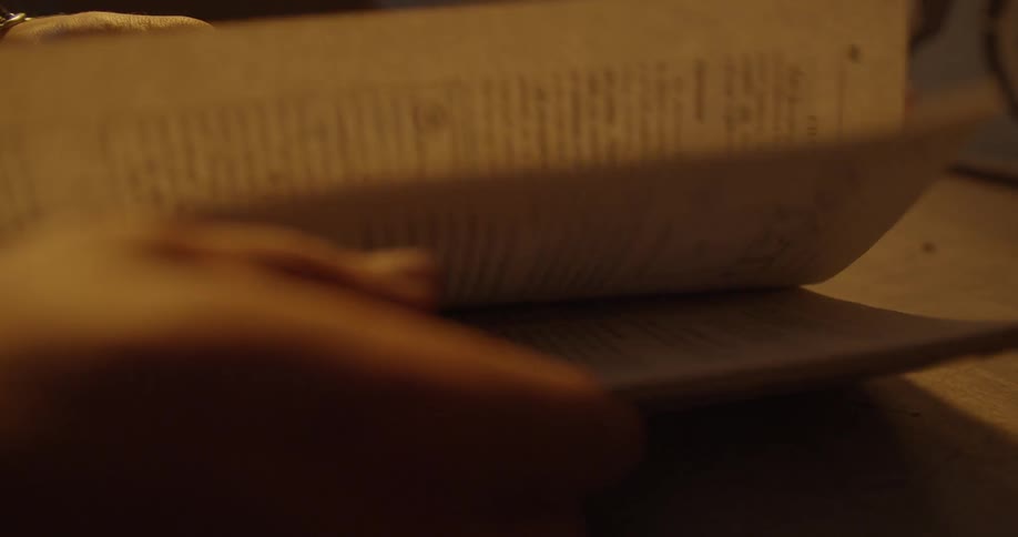 A person looks at an instruction manual