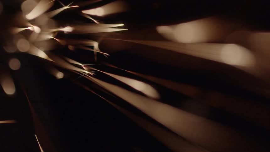 Sparks fly through the air