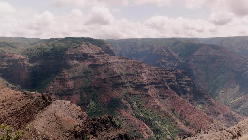 Clouds float above a canyon in the wilderness