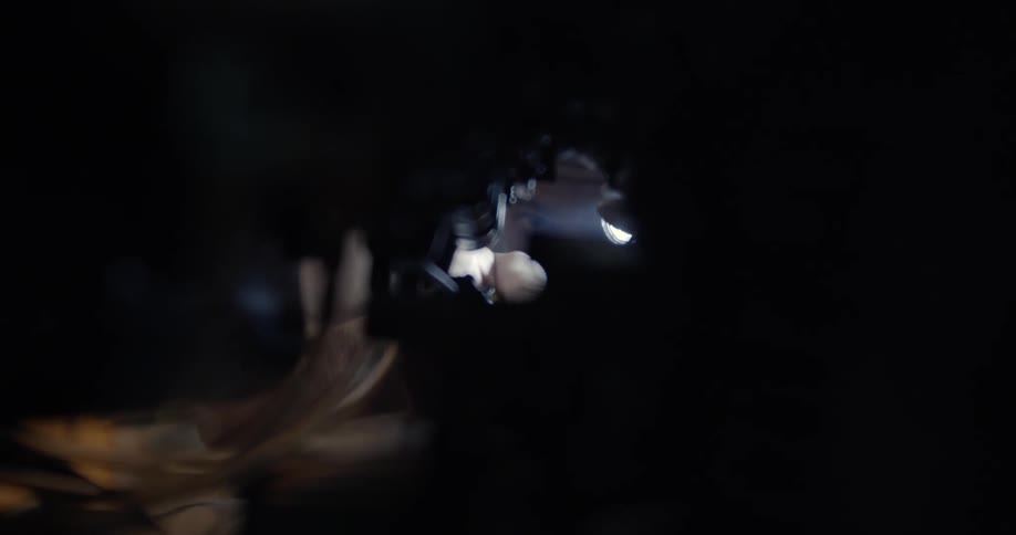 A person is working on an engine