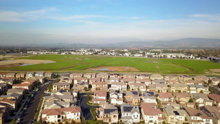 Houses sit in a neighborhood