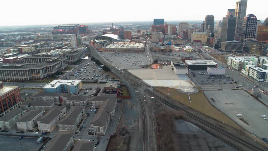 The cars drive and park in the city