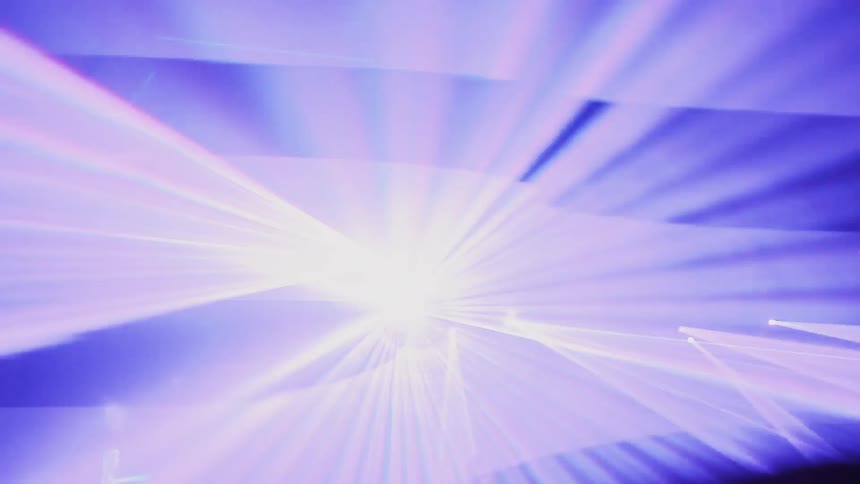 The strobe lights flash around in the club