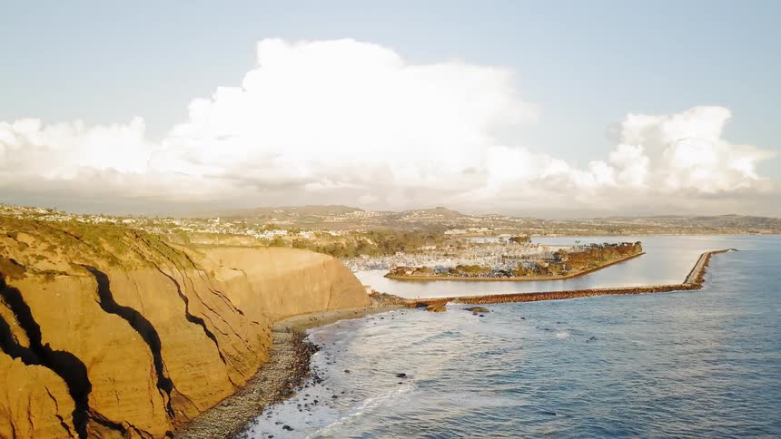 Ocean waves flow towards a shoreline
