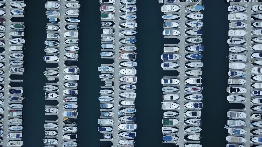 Boats float in a marina