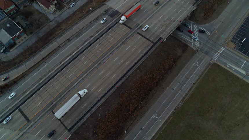The highway is full of cars on the overpass