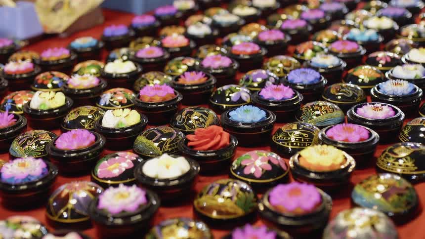 Rows of colorful ornate containers