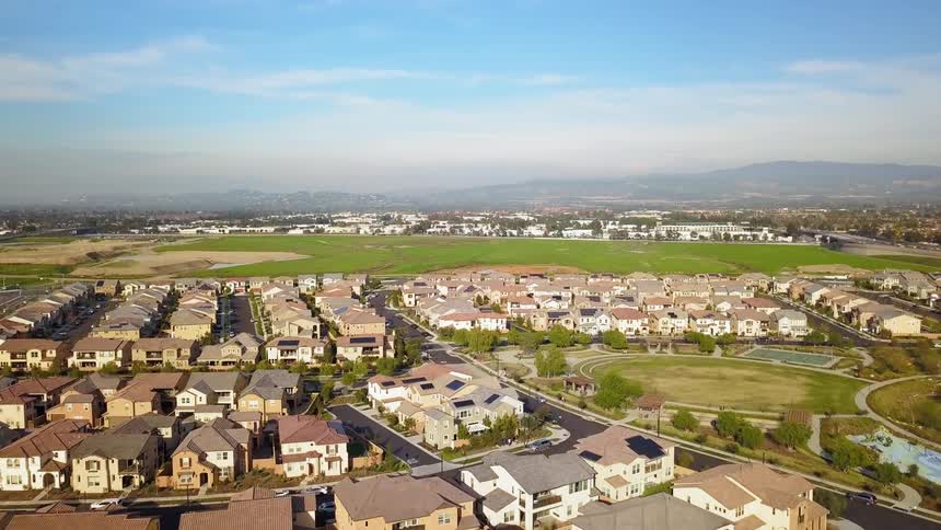 Houses sit in a neighborhood
