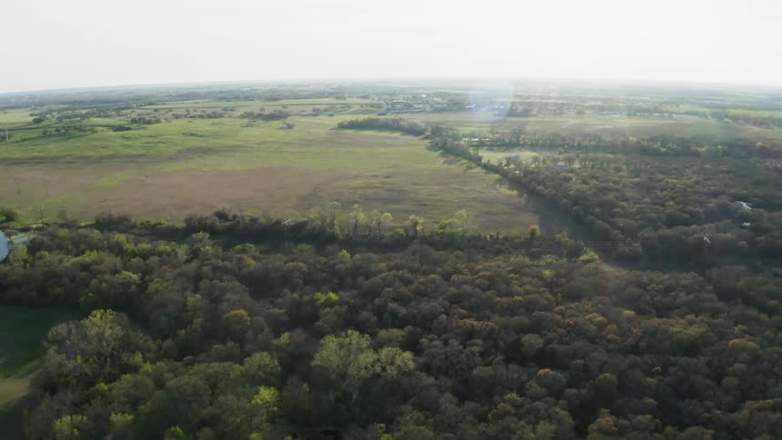 Sunlight shines on a rural landscape