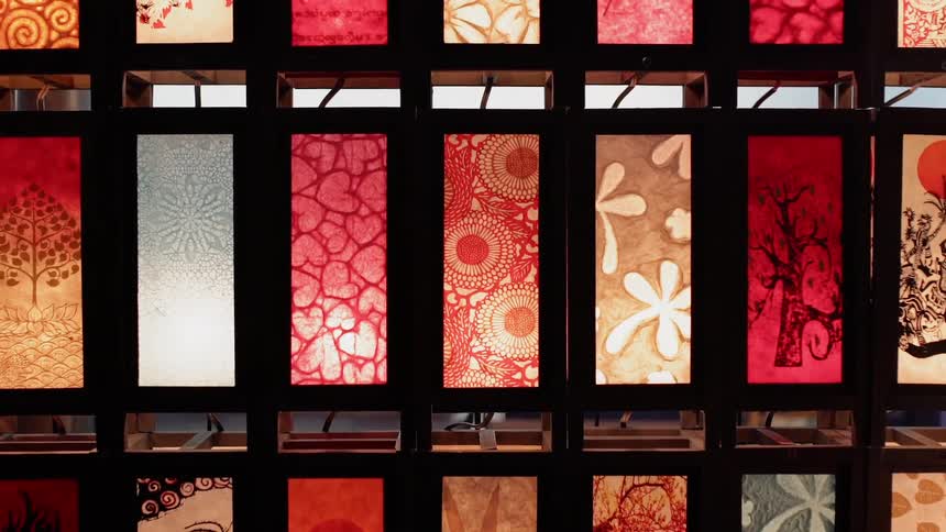 Light shines through stained glass windows