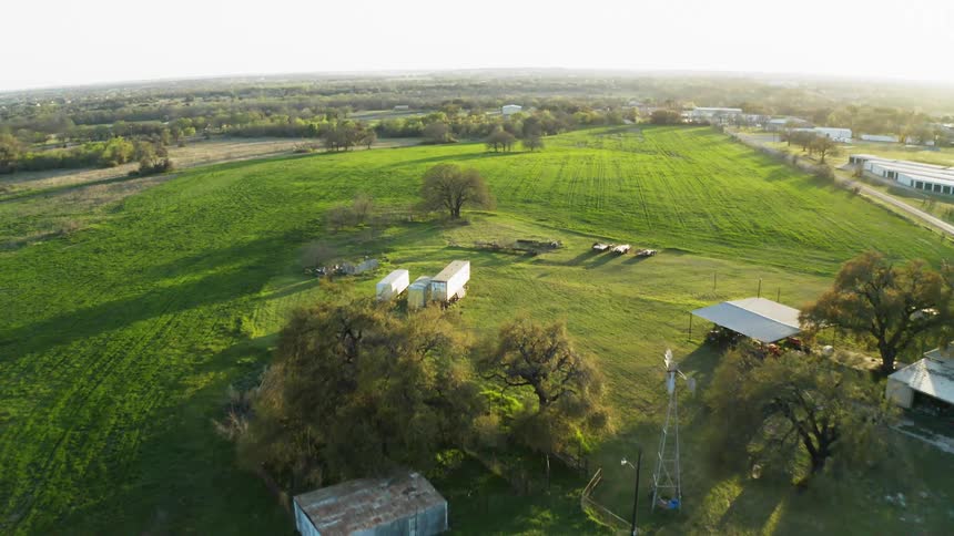 Cars drive in a rural community