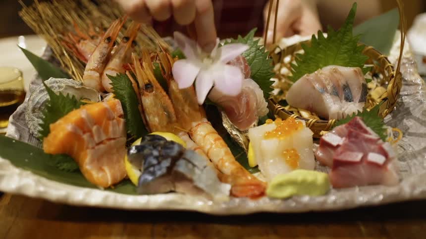 The plate has different foods on it
