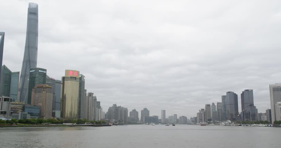 Grey clouds hang above the city skyline