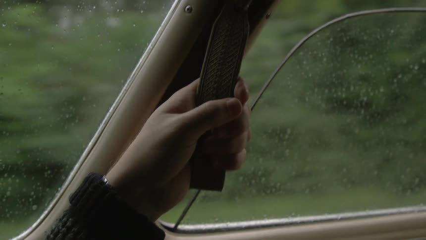 A person sitting in a car