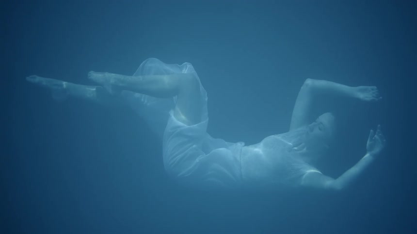 A woman floats in the water