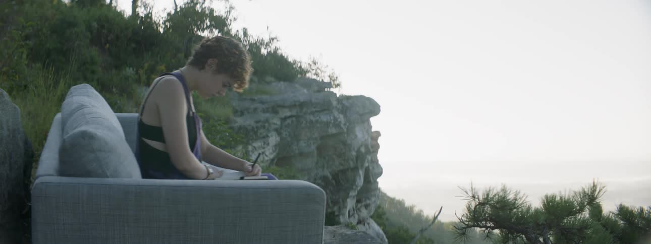 Teen On Couch In Nature