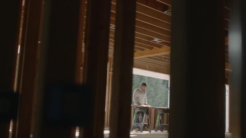 A man works at a construction site