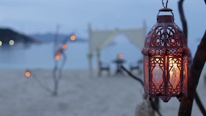 The lamps are lit on the beach