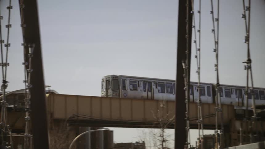 The train passes by on a sunny day