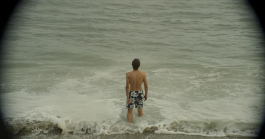 A man walks into the water