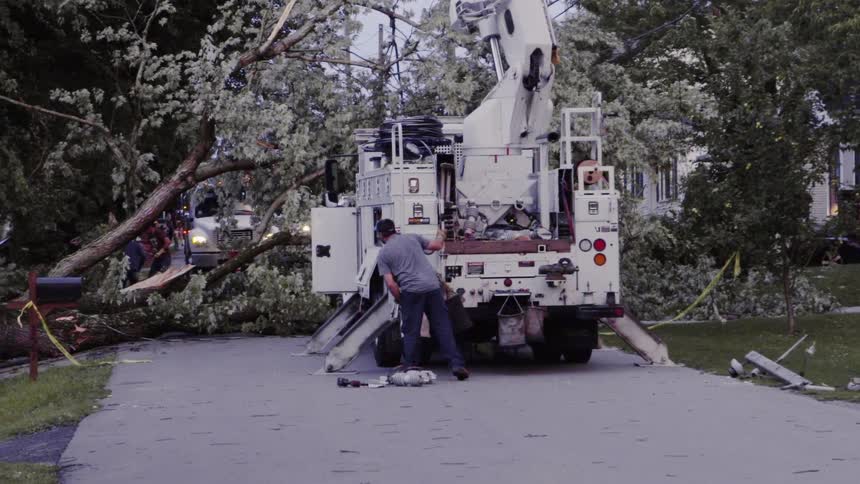 A man walks over to a lift truck