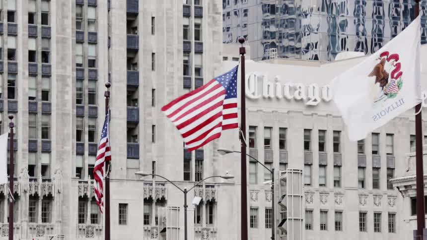 Flags Wave in Front of Chicago Tribune