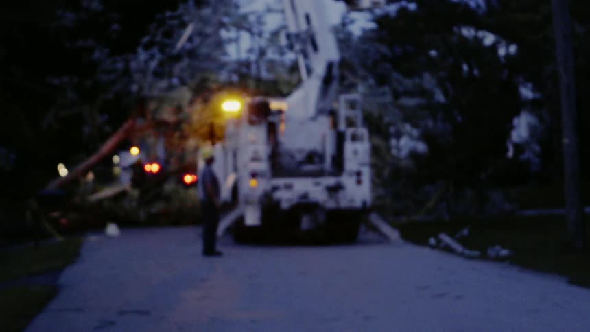 An electrical repair truck flashes its lights