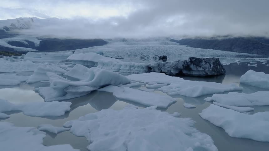 The icebergs fill the water