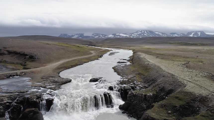 A river flows through a remote landscape