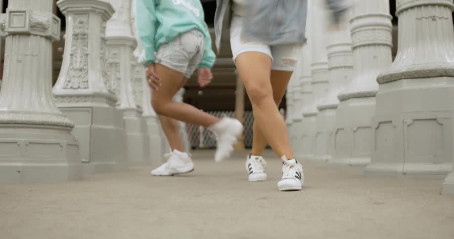 The feet of two people dancing