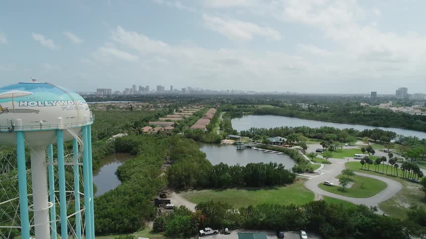 The houses are near a pool of water