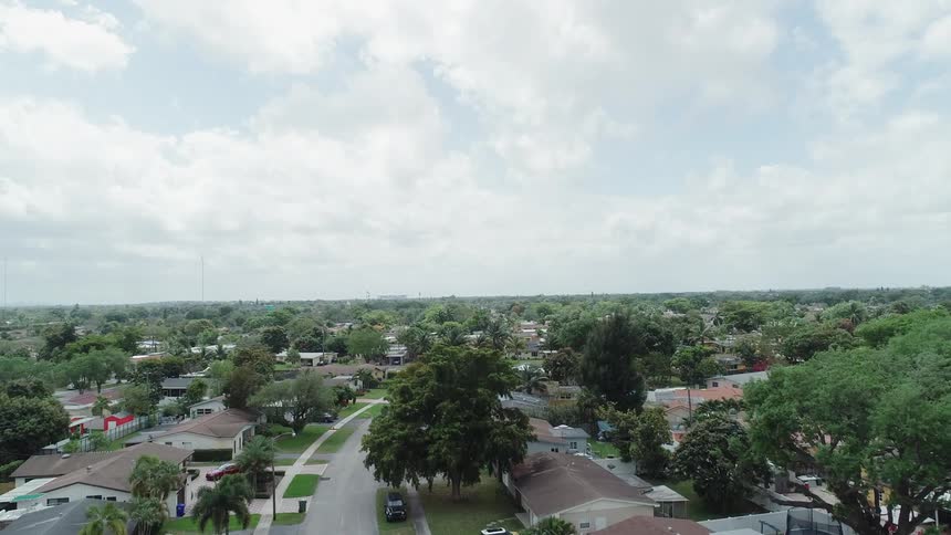 The street in the neighborhood is empty