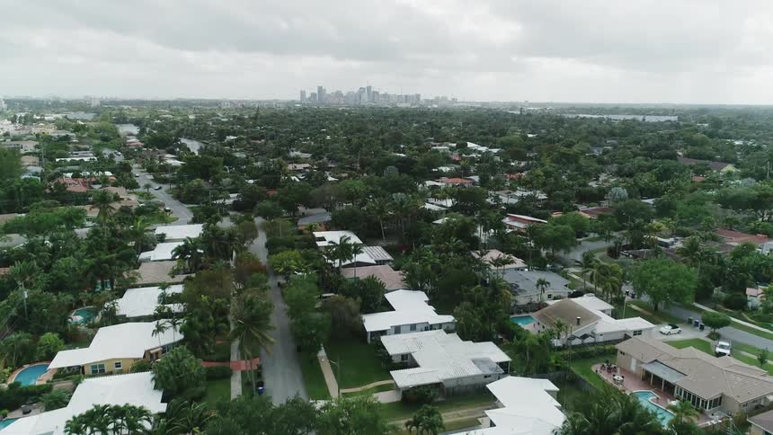 Houses sit in a neighborhood