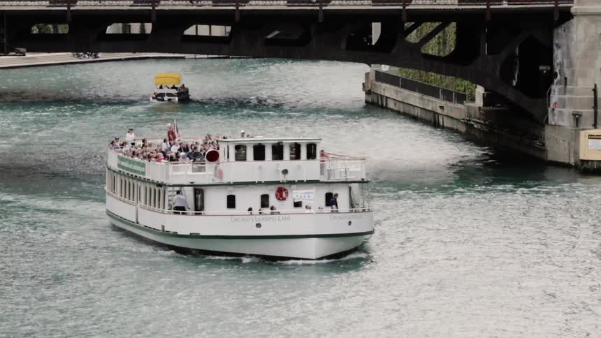 A ferry boat travels along the canal