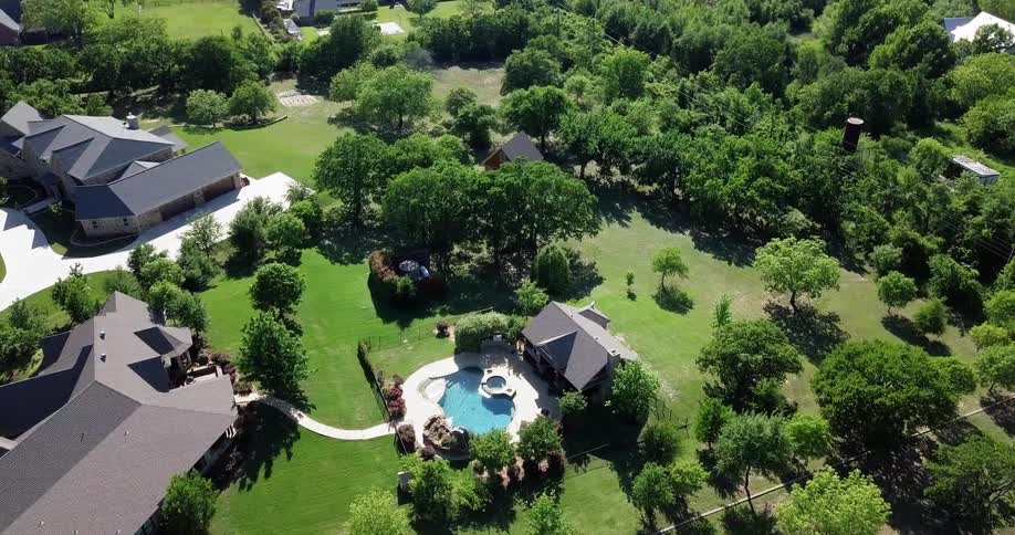 Houses and trees cover a residential area