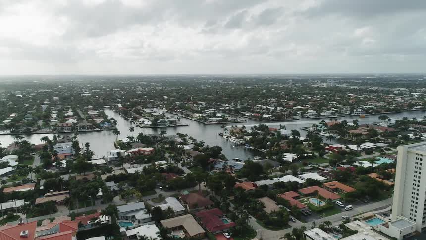 Homes with boats and docks line the canals