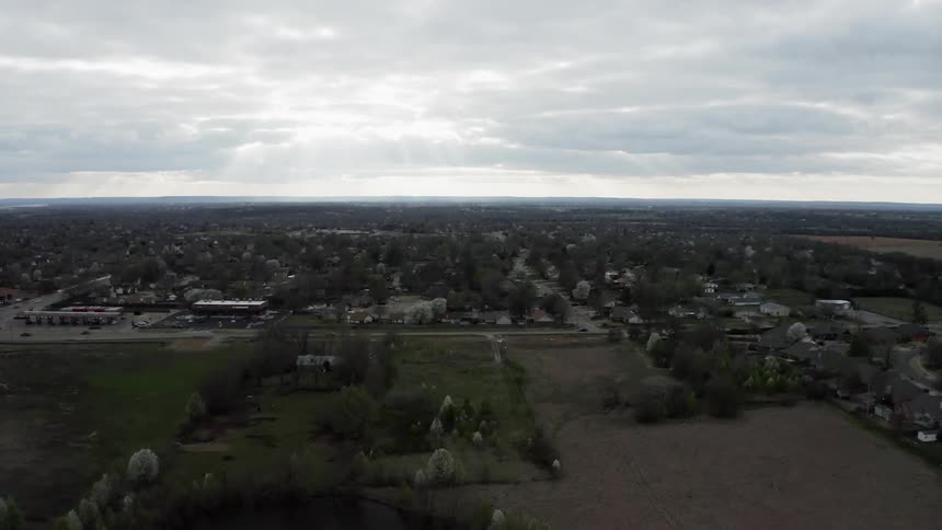 Clouds float above a town