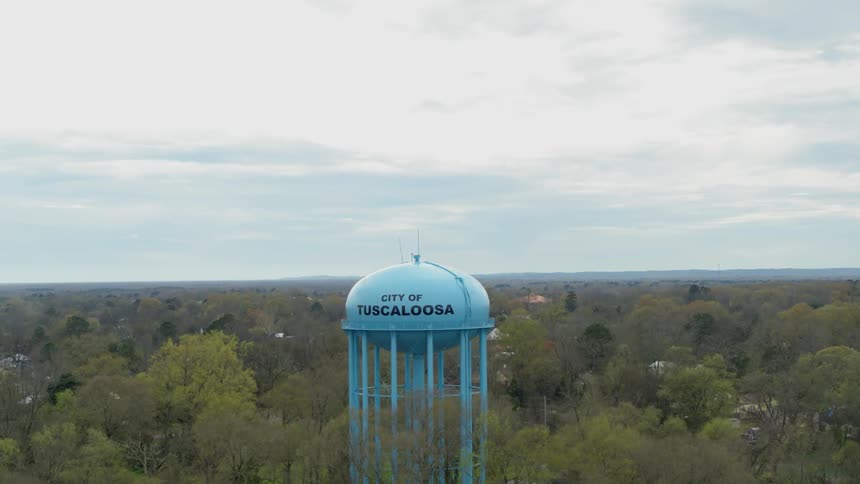 A water tower stands in the city of tuscaloosa