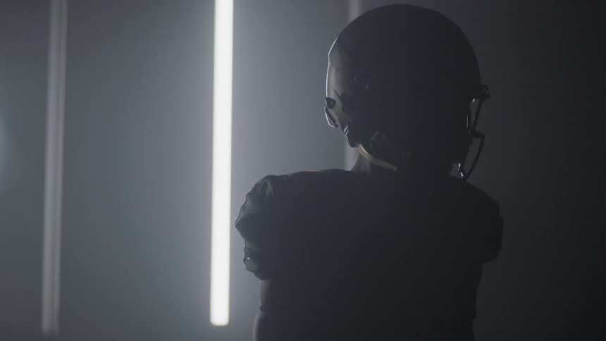 The light flashes on the football player