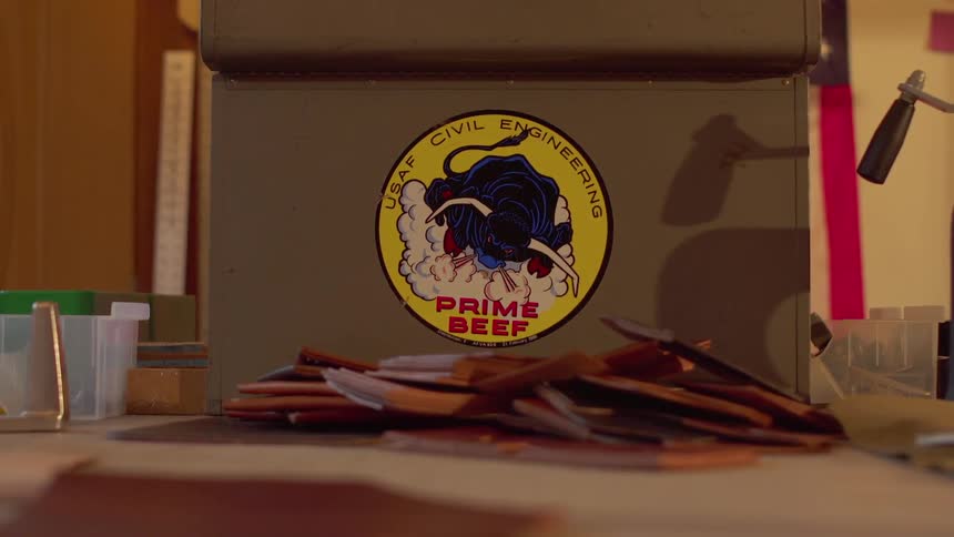 The box on the table has a sticker on it