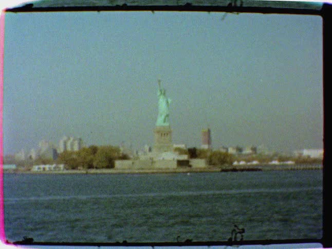 Statue of liberty observed from vehicle on the water