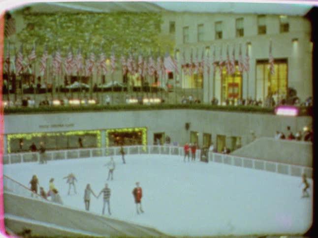 Ice rink with with people skating