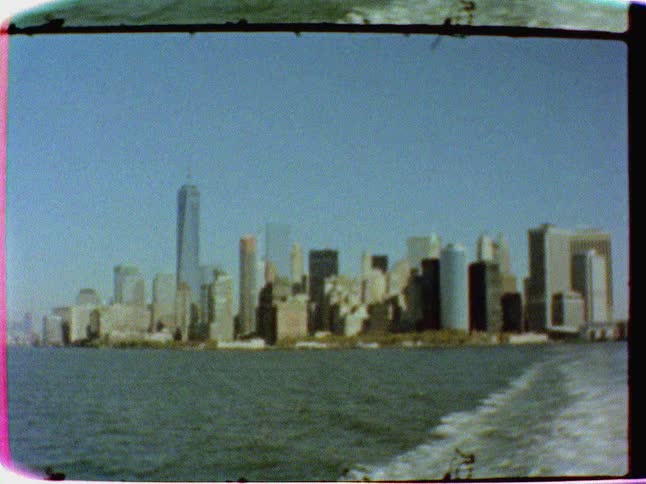 Wide shot of a city (manhattan) seen from a boat