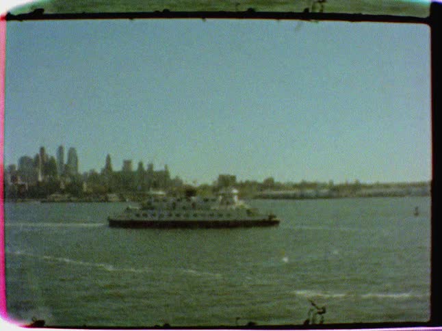 A large boat is seen in the bay