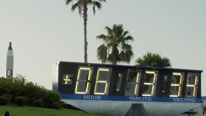 Timer shows hour and minutes in a city