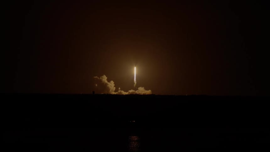 A shuttle is launched in the night