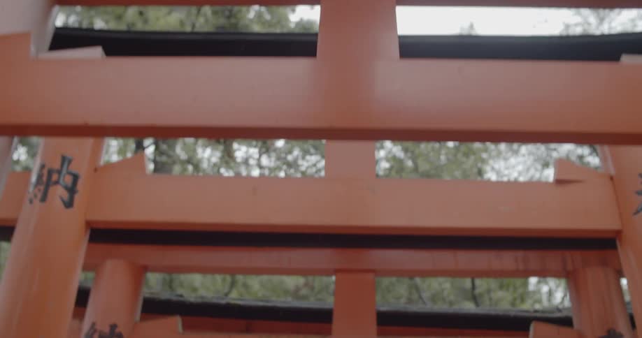 A red tunnel stands in a park in asia