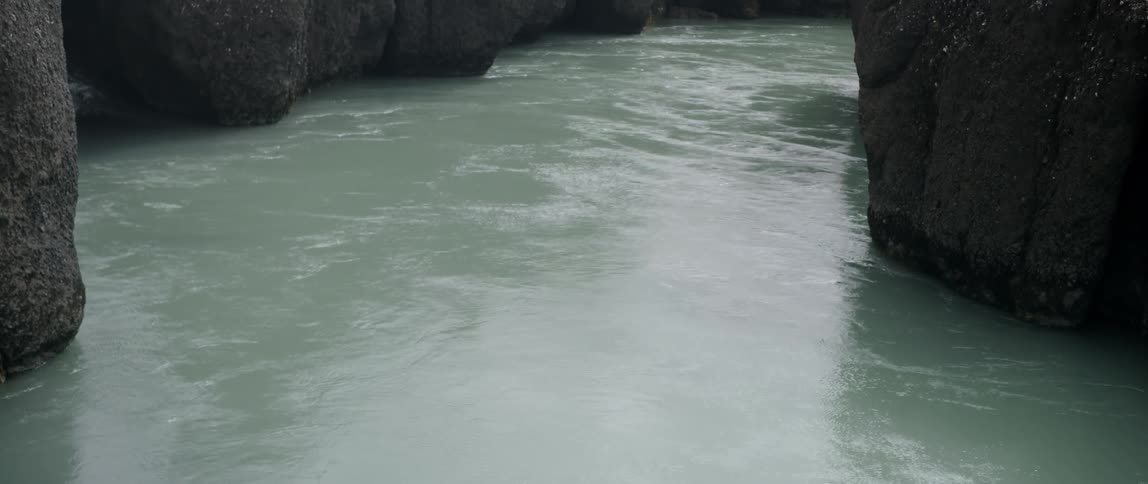 A river flows through a canyon